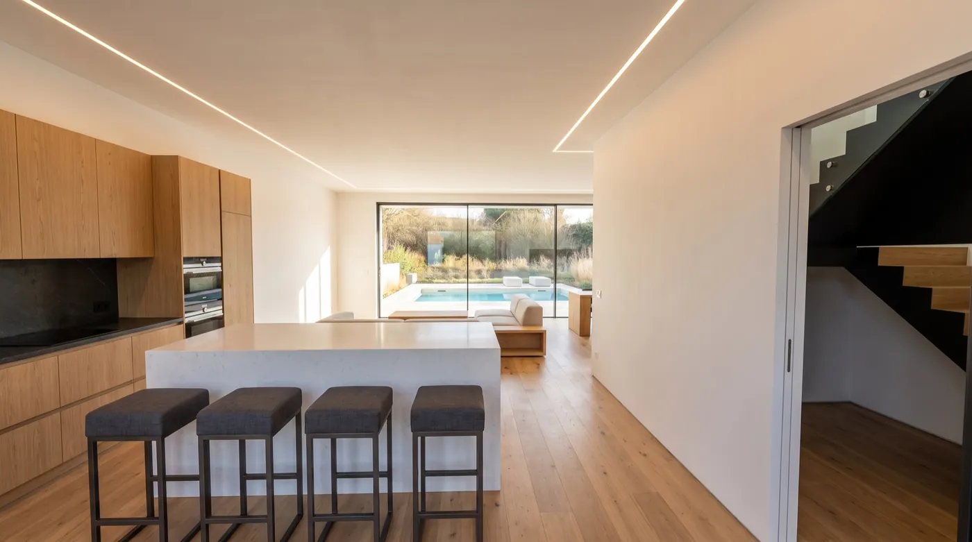 Salón, comedor y cocina abiertos al jardín